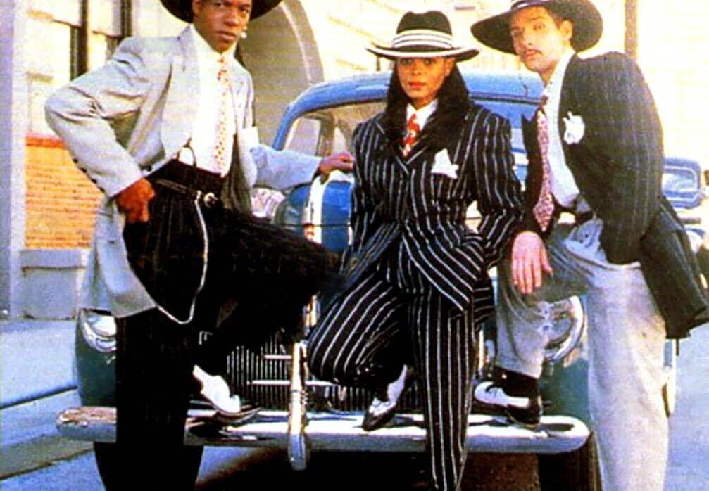 Janet Jackson wearing pinned striped Zoot Suit 