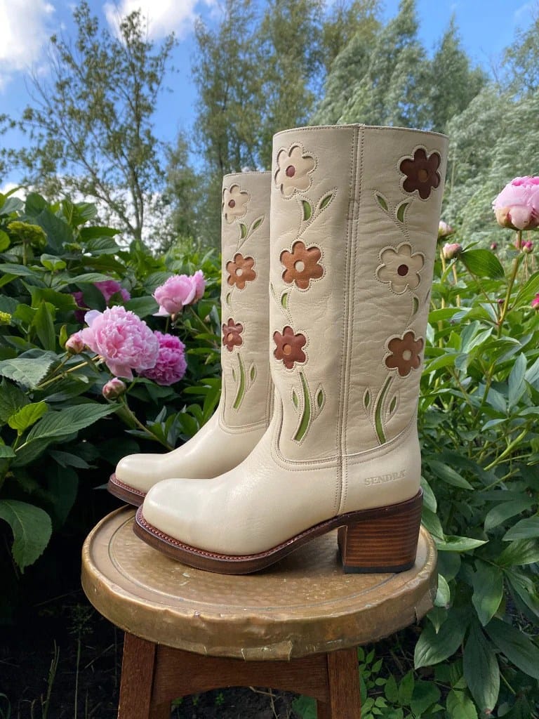 Flower cut out boots in cream made by dandelie 