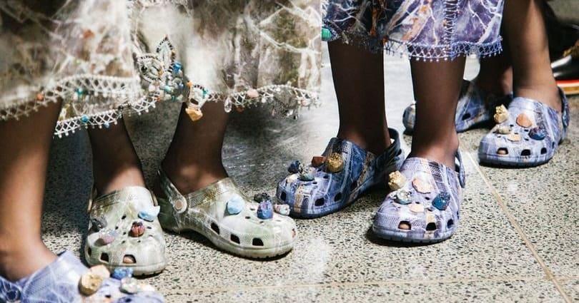Photo of crocs embedded with healing crystals